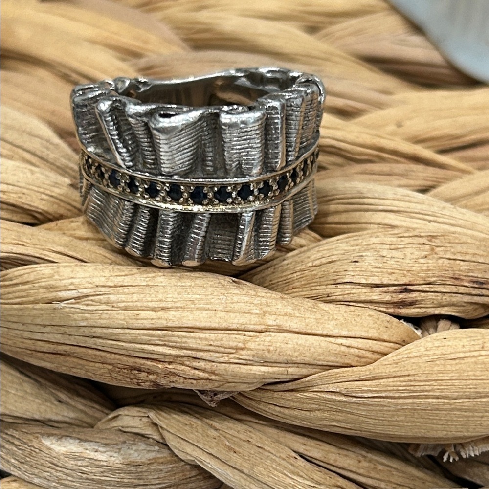 Elegant Silver Ring with Black Sapphire and Gold Accents